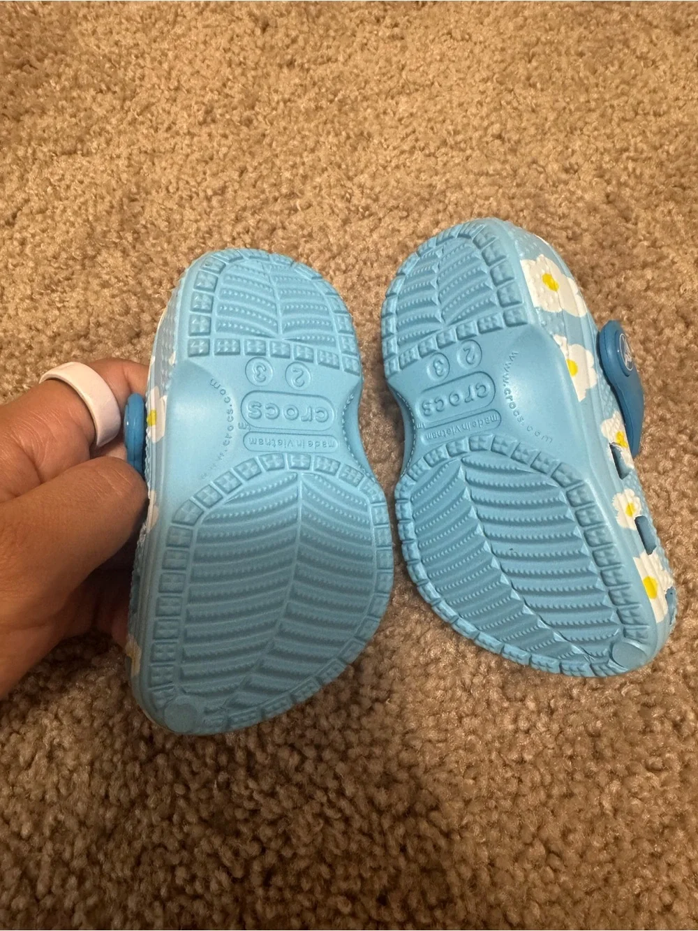 CROCS Kids Blue Floral Clogs with Yellow Centers
